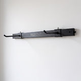Soporte metálico de pared